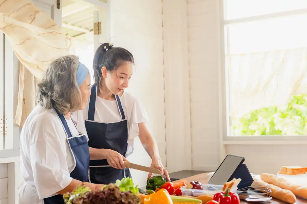 Myanmar Maid Agency in Singapore: Employer Teaching the Helper